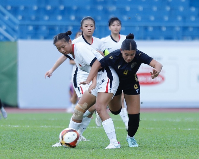 Guam (áo đen) bi loại sau 2 trận thua. Ảnh: Anh Khoa 