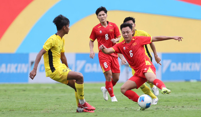 Thái Sơn (áo đỏ) đã có một kỳ SEA Games thành công. Ảnh - Đức Cường