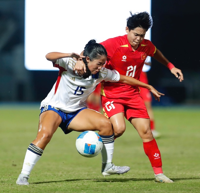 Cuộc tranh T của ĐT nữ Việt Nam và Philippines ở chung kết SEA Games 33 - Ảnh: Đức Cường